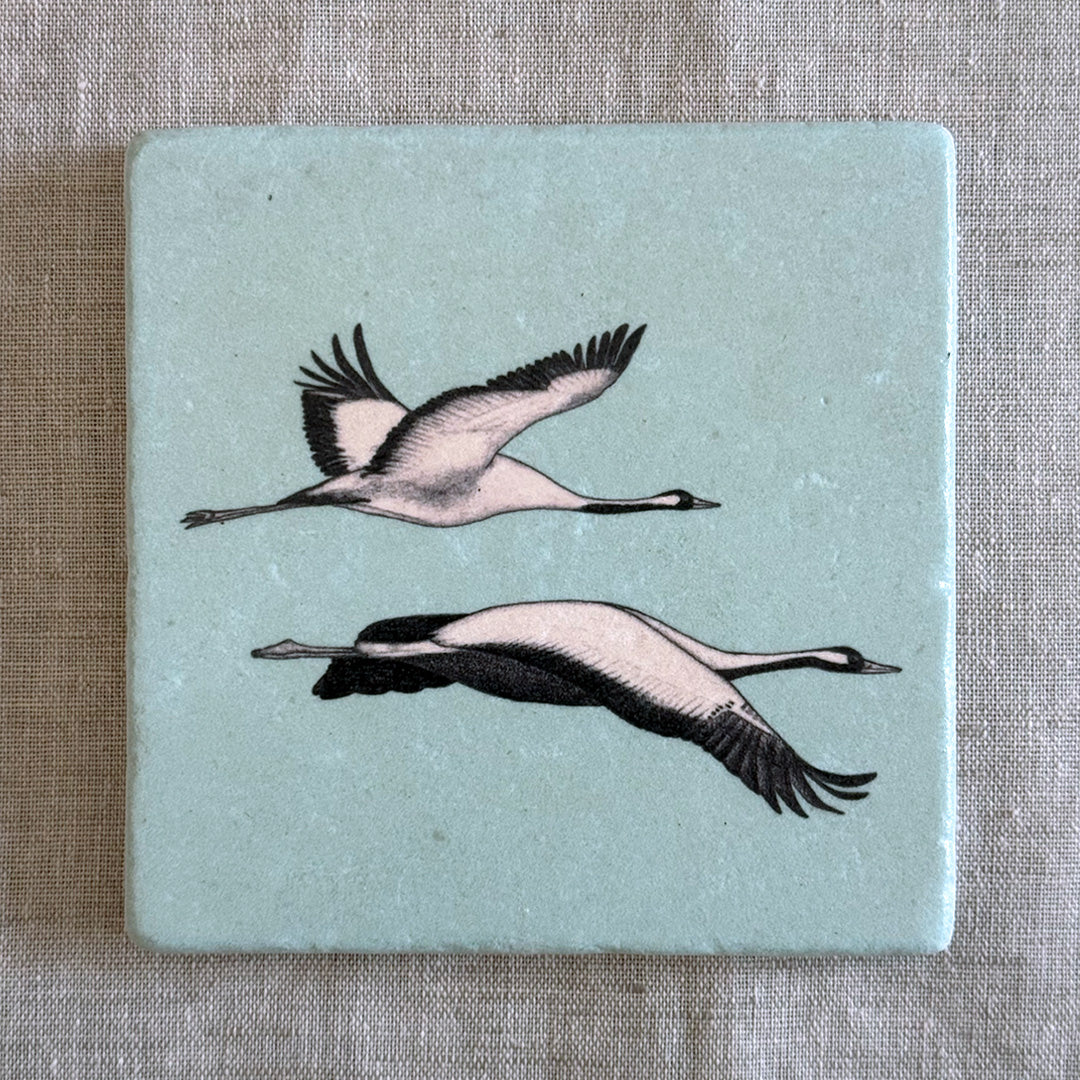 Fliese aus Naturstein / Kraniche